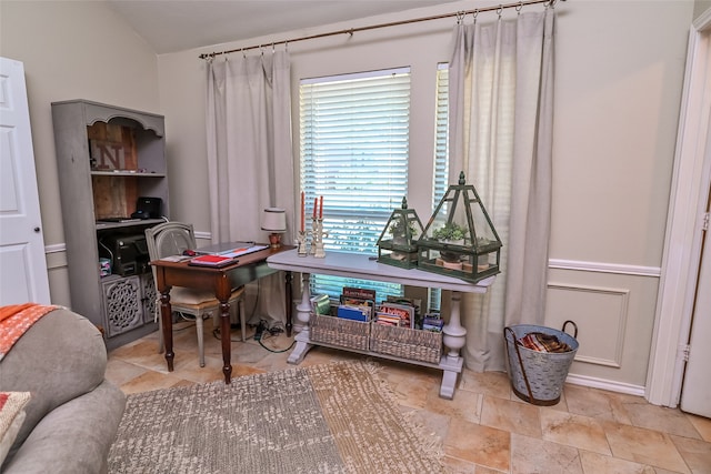 home office featuring vaulted ceiling