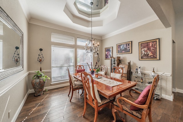 dining area with crown molding, dark hardwood / wood-style floors, and an inviting chandelier