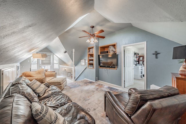 carpeted living room featuring lofted ceiling, a textured ceiling, and ceiling fan