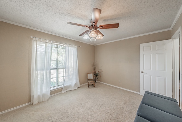 living area featuring light carpet, crown molding, a textured ceiling, and ceiling fan