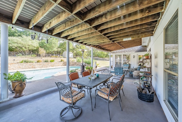 view of patio featuring a fenced in pool