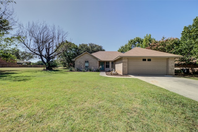 single story home featuring a garage and a front lawn