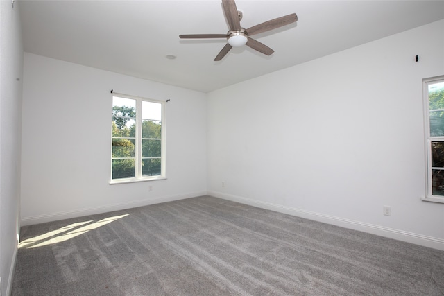 carpeted empty room with ceiling fan