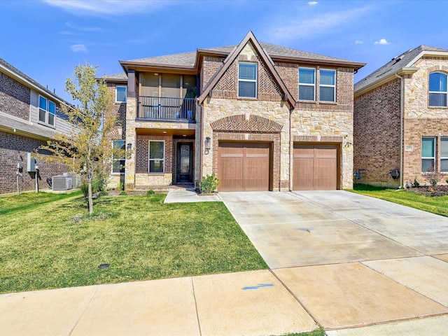 view of front of property with a front yard, stone siding, driveway, and central AC unit