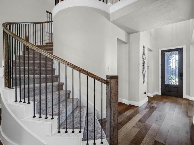 dining area with dark hardwood / wood-style flooring and a chandelier