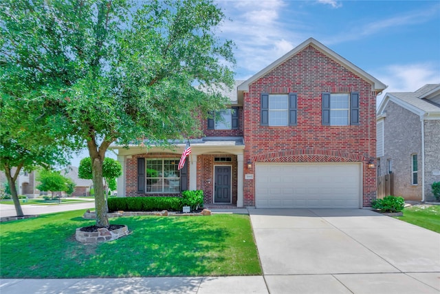 view of front property featuring a front lawn and a garage