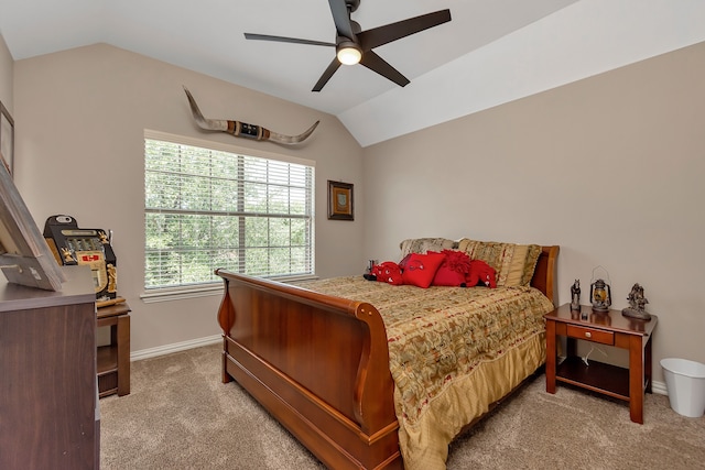 carpeted bedroom with lofted ceiling and ceiling fan