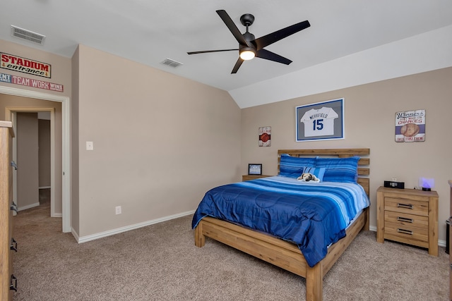 carpeted bedroom with lofted ceiling and ceiling fan