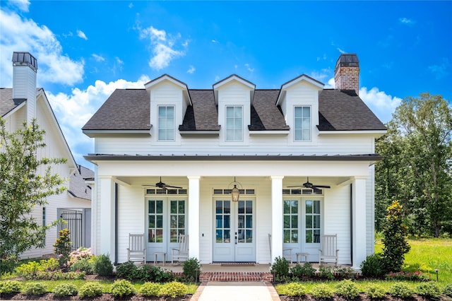 2108 Pecan Square Ave, Shreveport, LA 71106 - view of front facade with covered porch, french doors, roof with shingles, and a ceiling fan