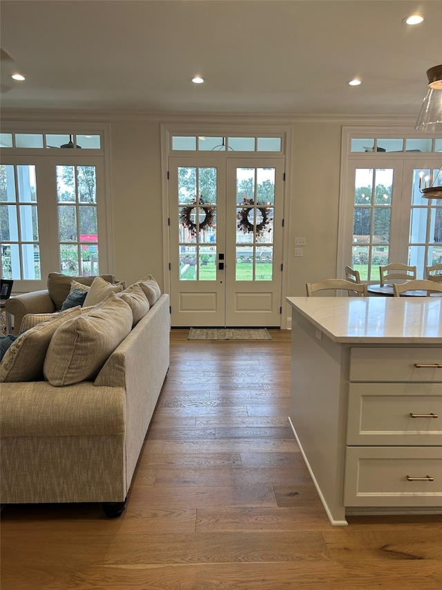 entryway featuring french doors and light hardwood / wood-style floors