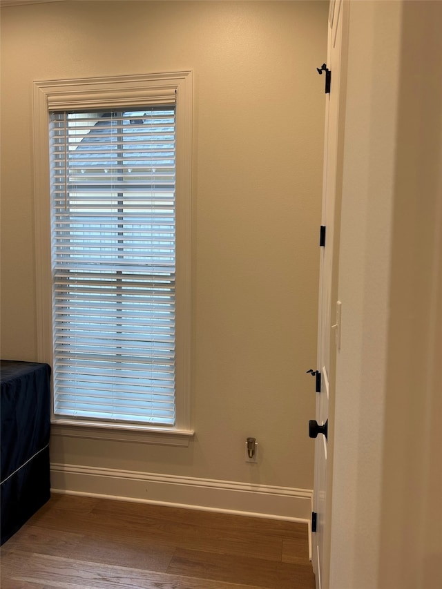 interior details featuring hardwood / wood-style floors