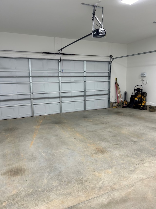 garage featuring a garage door opener