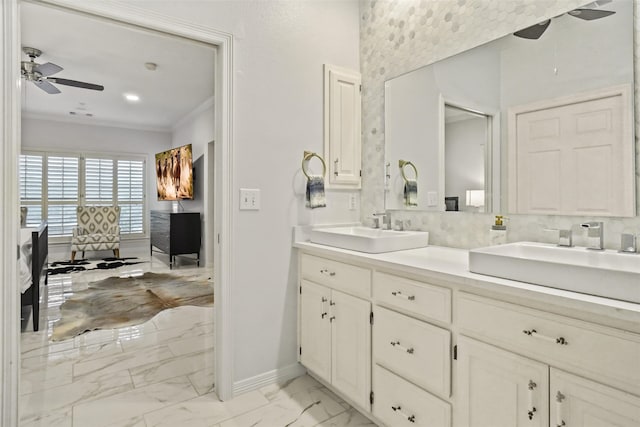 bathroom featuring vanity, ceiling fan, and ornamental molding