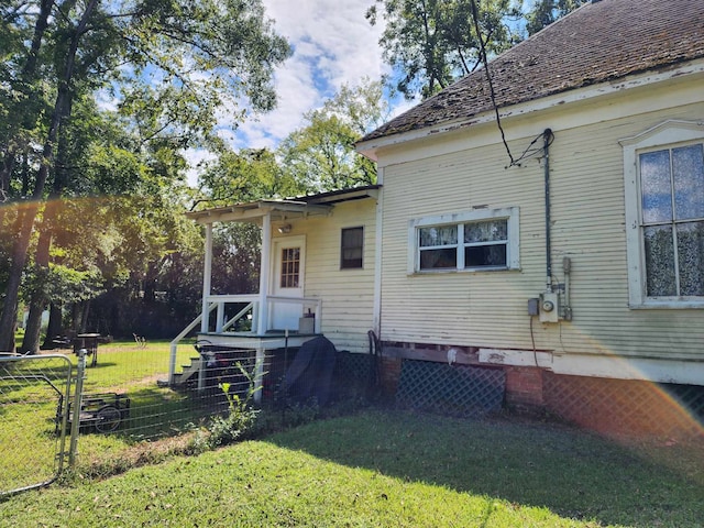 exterior space featuring a yard