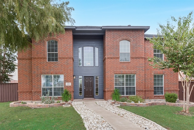 view of front facade with a front yard