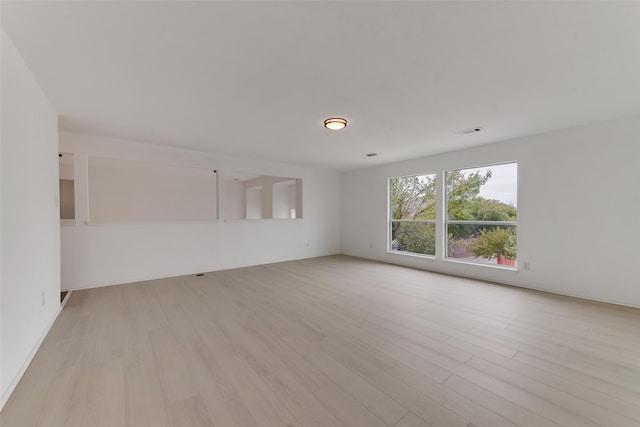 empty room featuring light hardwood / wood-style floors