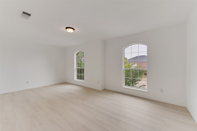 empty room with light wood-type flooring