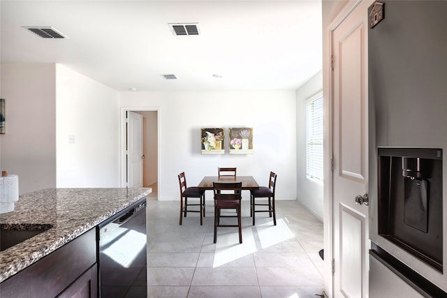 view of tiled dining space