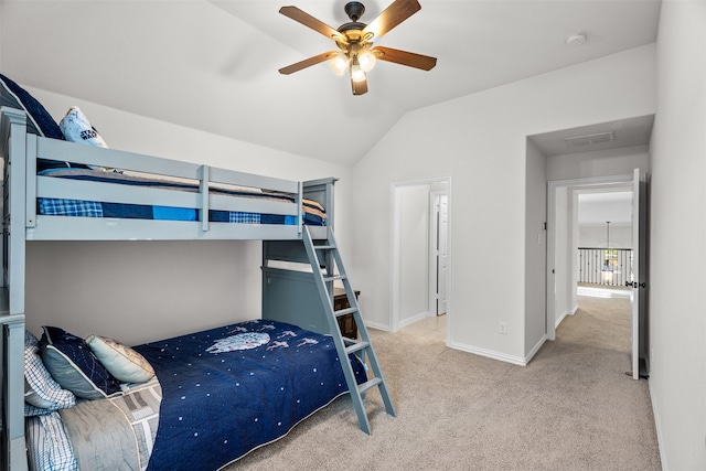 bedroom featuring ceiling fan, light carpet, and lofted ceiling