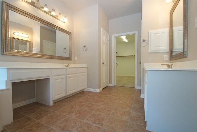 bathroom featuring vanity and tile patterned flooring