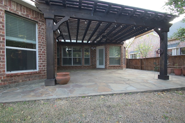 view of patio featuring a pergola