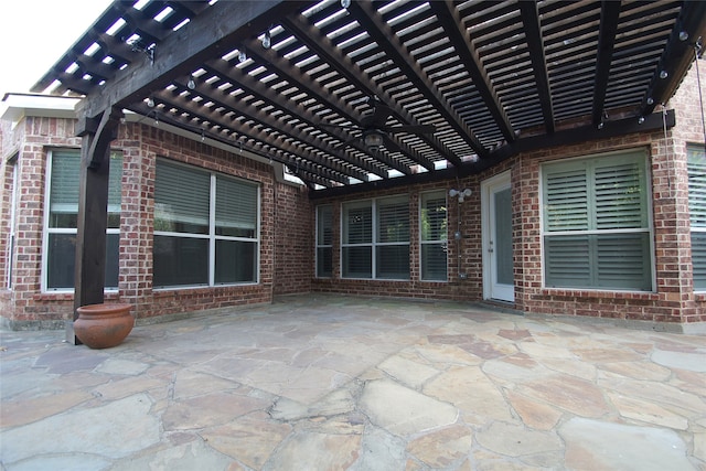 view of patio featuring a pergola