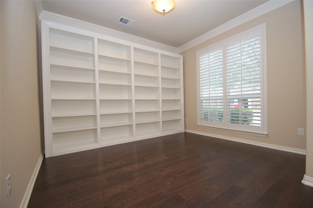 unfurnished room with dark wood-type flooring and ornamental molding