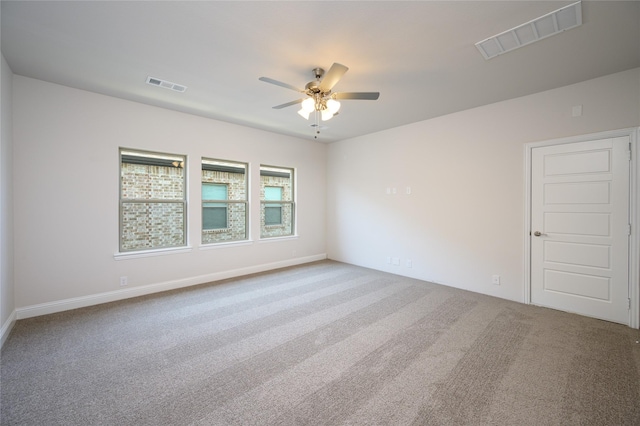 carpeted empty room with ceiling fan