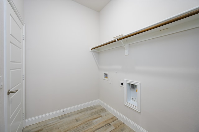 laundry room featuring hookup for a gas dryer, hookup for a washing machine, light wood-type flooring, and hookup for an electric dryer