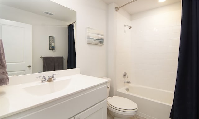 full bathroom featuring vanity, toilet, and shower / tub combo