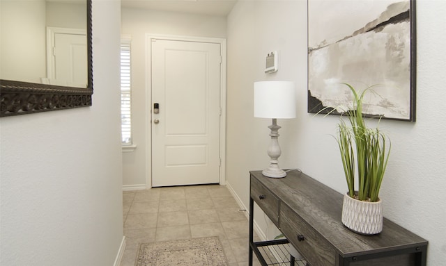 view of tiled foyer entrance