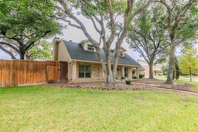 view of front of home with a front yard