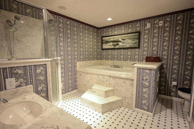 bathroom featuring sink, toilet, ornamental molding, a textured ceiling, and tiled tub