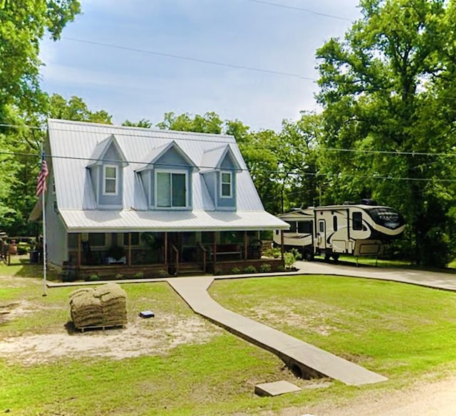 view of front facade with a porch and a front yard