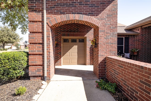 entrance to property with a garage