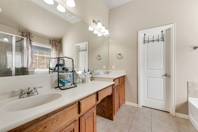 bathroom featuring vanity, tile patterned floors, vaulted ceiling, and separate shower and tub