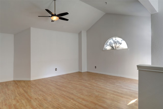 unfurnished living room featuring light hardwood / wood-style floors, ceiling fan, and lofted ceiling