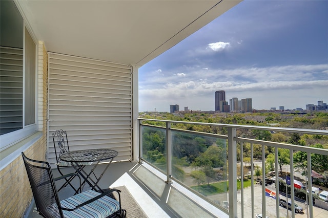 balcony featuring a view of city