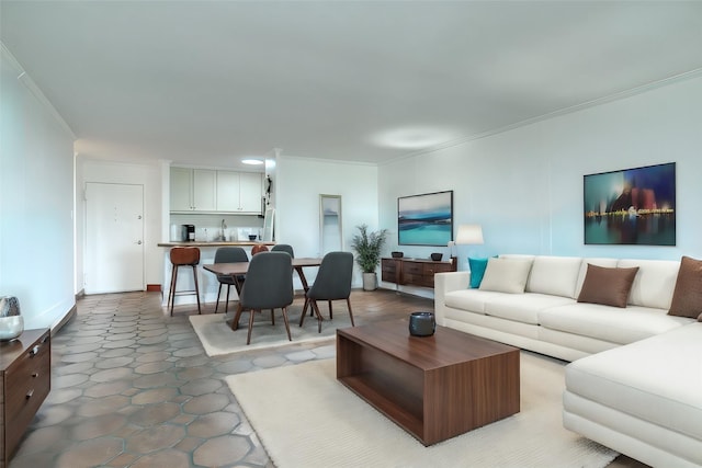 living area with crown molding