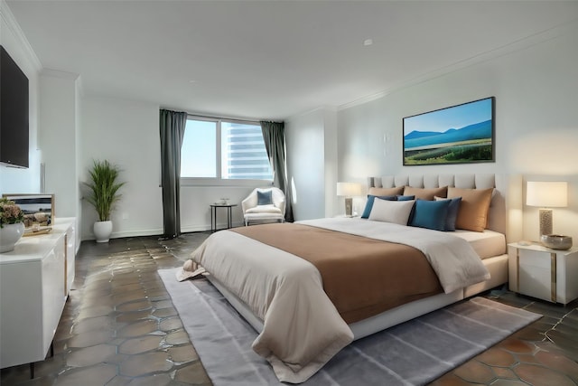 bedroom with baseboards and ornamental molding