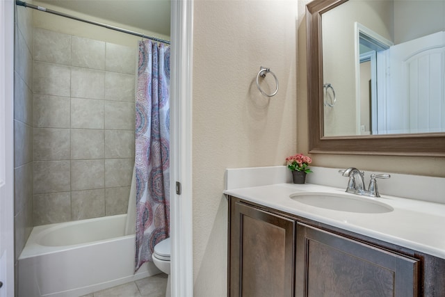 full bathroom featuring vanity, toilet, tile patterned floors, and shower / bath combo with shower curtain