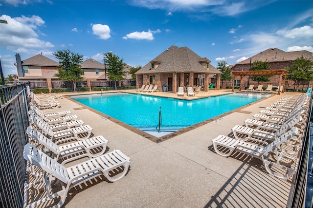 view of swimming pool with a patio area