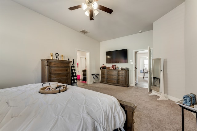 bedroom featuring ceiling fan and light carpet