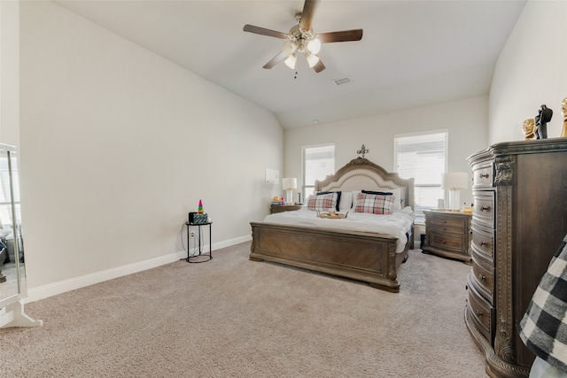 carpeted bedroom featuring ceiling fan and lofted ceiling