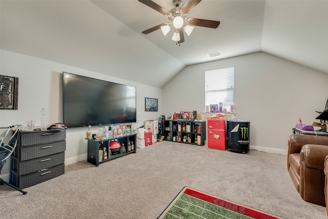 game room featuring light colored carpet, vaulted ceiling, and ceiling fan