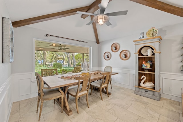 dining area featuring vaulted ceiling with beams and ceiling fan