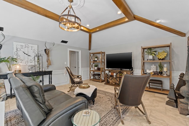 living room featuring a notable chandelier and vaulted ceiling with beams