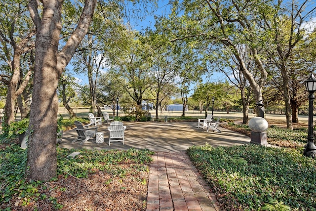 view of property's community with a patio