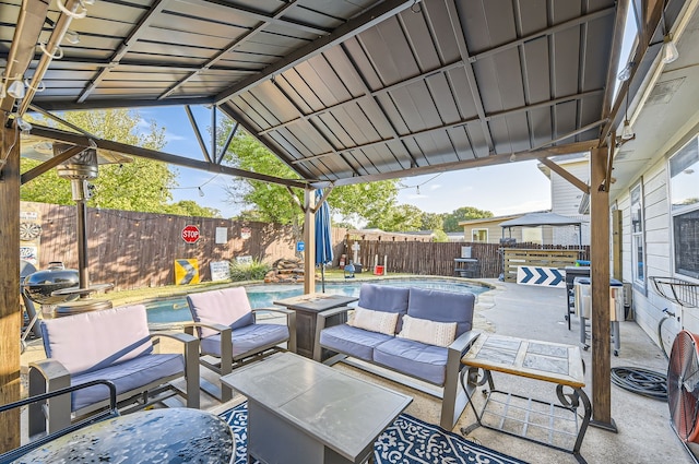 view of patio with a fenced in pool