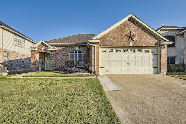 view of front facade featuring a front yard and a garage